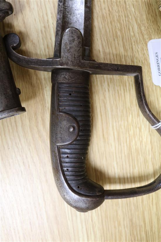 A Victorian sabre with etched blade and a mid 19th century sabre, both with scabbards